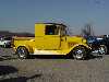 696yellowtrucksmall.jpg (36804 bytes)